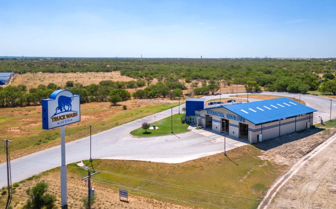 Aerial view of Blue Steer pole sign and building