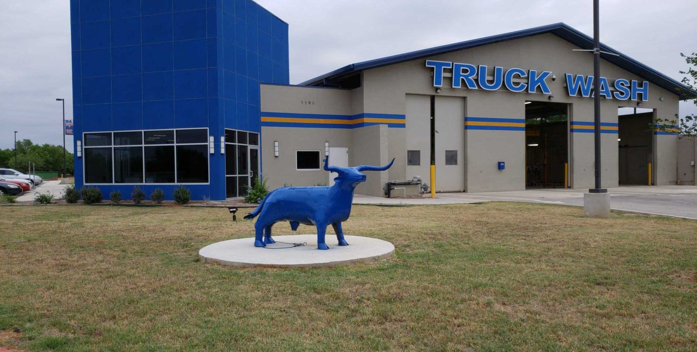 Blue Steer statue in front of the Blue Steer Truck Wash facility